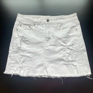 American eagle white ripped mini denim skirt size US 4 lightly used.